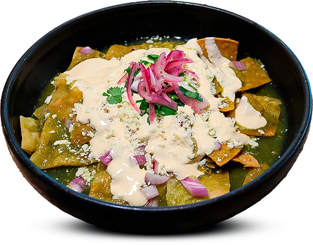 Chilaquiles verdes with crema and pickled onion
